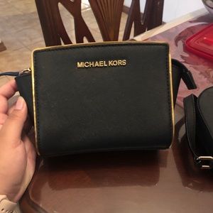 Michael Kors Black and gold detailed crossbody bag